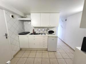Appartements J1 St-Quentin-en -Yvelines Studio en Rez de jardin avec parking : photos des chambres