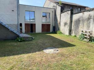 Appartements maison centre ville avec jardin partage : photos des chambres
