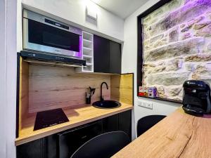 Appartements Studio Moderne a 5 min a pied du Chateau : photos des chambres