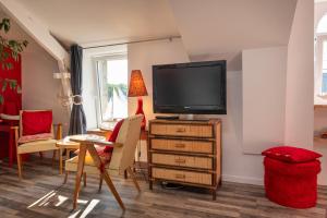 Appartements Studio dans maison proche gare : photos des chambres