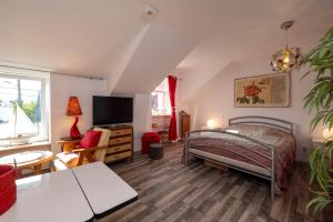 Appartements Studio dans maison proche gare : photos des chambres