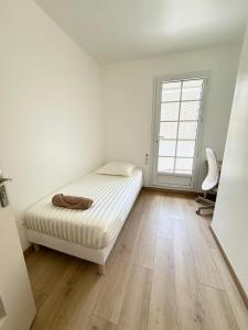 Villas Belle maison, 15mn de Paris, 2 parkings gratuits : photos des chambres