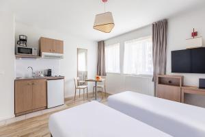 Appart'hotels Appart'City Confort Orleans : photos des chambres