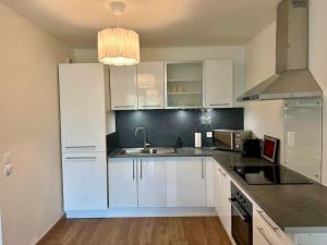 Appartements Suite Alya Appartement proche Disneyland : photos des chambres