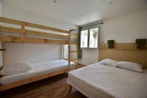 Appartements T2 en RDC climatise a 50m de la plage et du port : photos des chambres