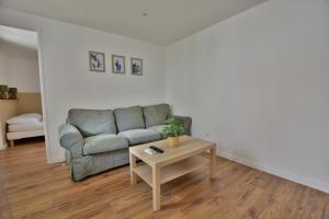 T2 en RDC climatisé à 50m de la plage et du port