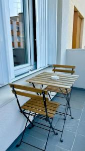 Appartements Beau Studio Cosy et calme - face a la gare de Rosny-sous-Bois - 20mn de Paris et Disneyland : photos des chambres