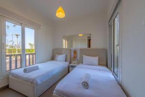 Gouna Retreat 2BR Apt Waterside Hot Tub & Pool