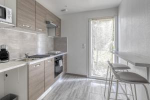 Villas ZACH & SPA - Maison jardin a 20 min de Paris & Aeroport CDG : photos des chambres