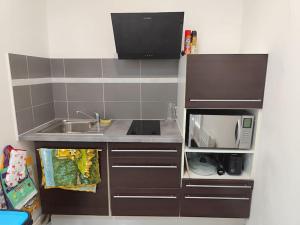 Appartements Appartement La Pause Bleue : photos des chambres