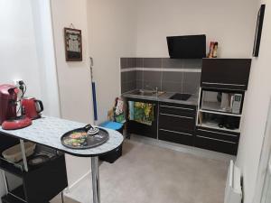 Appartements Appartement La Pause Bleue : photos des chambres