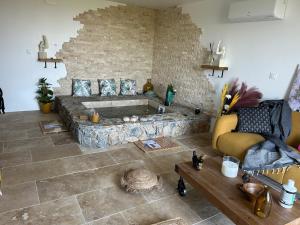 Appartements I pozzi jacuzzi furiani love room haute corse : photos des chambres