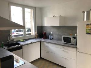 Maisons de vacances Maison charmante en centre-ville de Valognes, pour 10 pers : photos des chambres