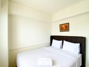 Cozy and Best Deal 2BR at Meikarta Apartment By Travelio