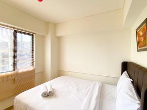 Cozy and Best Deal 2BR at Meikarta Apartment By Travelio