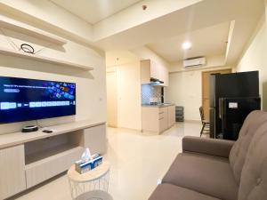 Serene Designed 2BR at Meikarta Apartment By Travelio