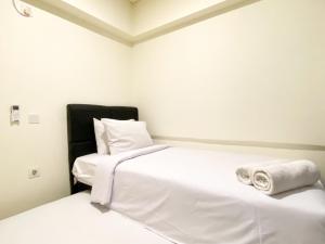 Comfort 2BR Meikarta Apartment By Travelio