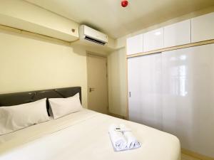 Best Homey and Modern 2BR at Meikarta Apartment By Travelio