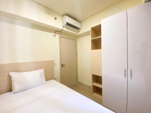 Best Homey and Modern 2BR at Meikarta Apartment By Travelio