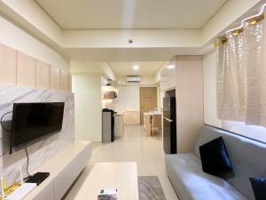 Best Homey and Modern 2BR at Meikarta Apartment By Travelio