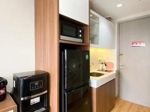 Warm and Cozy Studio at Vasanta Innopark Apartment By Travelio