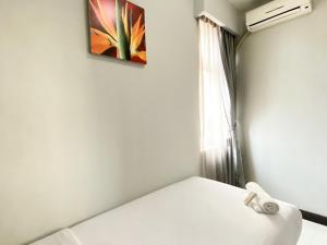 Homey 2BR Apartment Crown Court Executive Condominium By Travelio