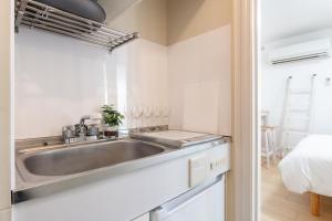 メゾンドミナ102号室