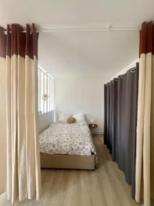 Appartements T1 de standing a Port Boinot avec balcon : photos des chambres