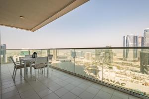 Special Deal 2BR with Canal Views & Relaxing Balcony by Deluxe Holiday Homes