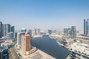 Special Deal 2BR with Canal Views & Relaxing Balcony by Deluxe Holiday Homes