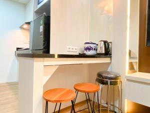 Cozy and Homey Studio at Vasanta Innopark Apartment By Travelio