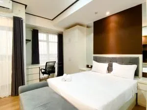 Cozy and Homey Studio at Vasanta Innopark Apartment By Travelio - Cibuntu