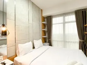 Homey and Minimalist 1BR Vasanta Innopark Apartment By Travelio - Cibuntu