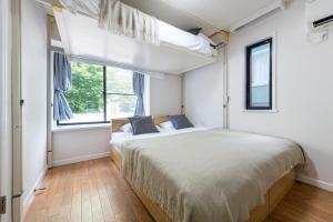 メゾンドミナ201号室