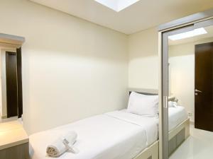Cozy and Comfort 2BR at Pollux Chadstone Apartment By Travelio