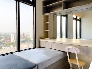 Cozy and Comfort 2BR at Pollux Chadstone Apartment By Travelio