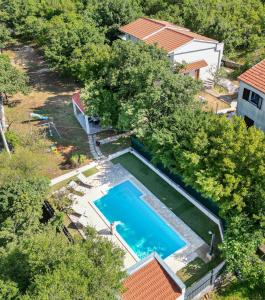 House Runjic with pool, large garden and playground