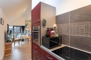 Appartements La Canopee Urbaine - Apt centre-ville avec parking : photos des chambres