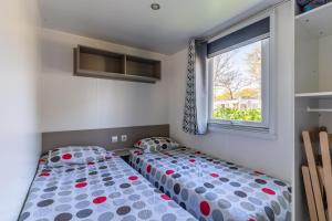 Campings Mobilehome Veronique : photos des chambres