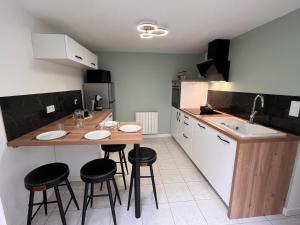 Appartements Maison du Colombier : photos des chambres