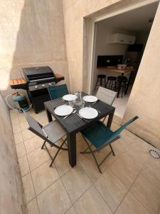 Appartements Maison du Colombier : photos des chambres