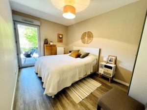 Appartements La parenthese - jardin privatif : photos des chambres