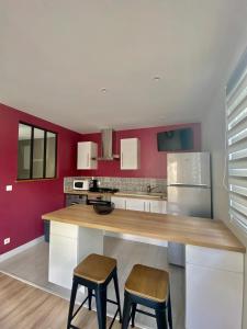Appartements Le Cocon : calme et moderne a 15 min Futuroscope : photos des chambres
