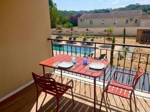 Le Clos de L-Oliveraie - Appartements de charme avec piscine proche d-Uzes : photos des chambres