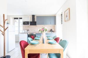 Appartements L-Etoile - Tout confort : photos des chambres