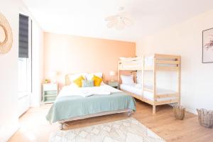 Appartements L-Etoile - Tout confort : photos des chambres