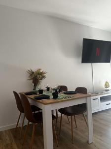 Leaf Apartament Łódź prywatne miejsce parkingowe