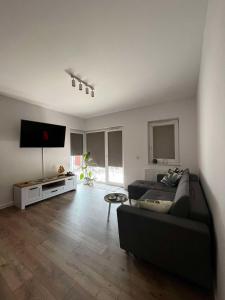 Leaf Apartament Łódź prywatne miejsce parkingowe