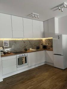 Leaf Apartament Łódź prywatne miejsce parkingowe