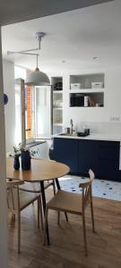 Appartement spacieux et moderne, en plein centre